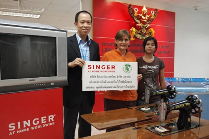 Singer hands over products